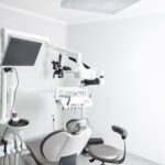 Bright dental clinic room with advanced equipment and a dental chair